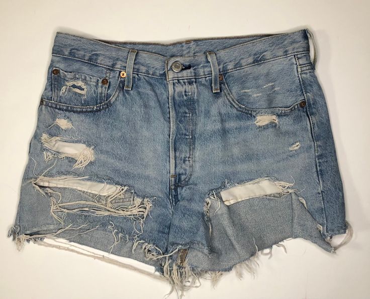 Looking for Vintage Cut Offs? I got them for you! Very large holed jean shorts, light washed and great condition. These are the perfect vintage thrift for that girl who wants to spice up an outfit and show off her legs! Great for summer time and beach trips, so many different style options! If you like these be sure to follow me on Instagram @Carliss_Closet for new content  More Thrifts on the way! Light Wash Levis, Vintage Thrift, Beach Trips, Cut Offs, Cut Off Shorts, Spice Up, Beach Trip, Cut Off, Summer Time