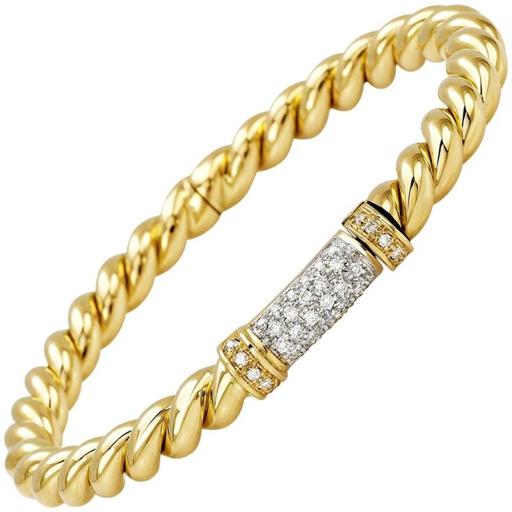 Rope bangle in 18 kt yellow gold and white diamonds This is a traditional collection in Micheletto the total weight of the gold is gr 22.40 the total weight of the white diamonds is ct 0.58 - color GH clarity VVS1 STAMP: 10 MI ITALY 750 The full set is available Luxury Yellow Gold Diamond Bracelet With Brilliant Cut, Luxury Brilliant Cut Yellow Gold Diamond Bracelet, Luxury Diamond Bracelet In Yellow Gold, Luxury Yellow Gold Diamond Chain Bracelet, Luxury Yellow Gold Bracelet With Brilliant Cut, Elegant Yellow Gold Diamond Bracelet With Accents, Luxury Brilliant Cut Yellow Gold Bracelet, Elegant Gold Bracelet With Diamond Accents In Diamond White, Luxury Yellow Gold Diamond Bracelet With Single Cut