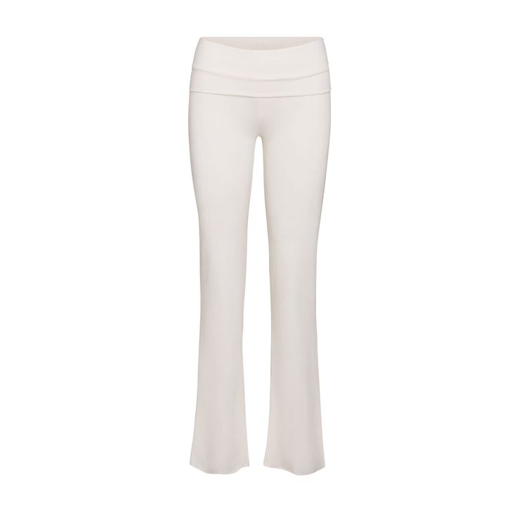 These soft and stretchy Cotton Jersey pants have a ‘00s-inspired foldover waistband with an ultra-feminine ruched detail. Solid Color Comfort Stretch Pants For Relaxation, Comfort Stretch Pants For Relaxation, Chic Stretch Yoga Pants Straight Style, Chic Stretch Yoga Pants With Straight Cut, Chic Stretch Yoga Pants With Straight Legs, Chic Stretch Wide Leg Yoga Pants, Chic Elastane Sweatpants For Loungewear, Spring Yoga Pants For Loungewear, Wide Leg Relaxed Fit Leggings For Loungewear