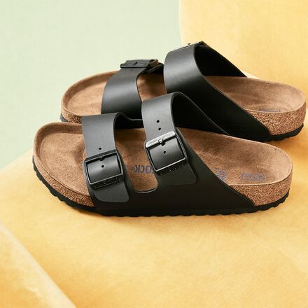 Stroll down the desert, over cacti, and through the sun's warm rays with the Birkenstock Women's Arizona Soft Footbed Sandal ensuring comfort every step of the way. Adjustable Casual Outdoor Footbed Sandals, Adjustable Casual Footbed Sandals For Outdoor, Casual Adjustable Footbed Sandals For Outdoor, Outdoor Leather Footbed Sandals, Summer Leather Footbed Sandals For Outdoor, Casual Outdoor Footbed Sandals With Textured Footbed, Summer Sandals With Cork-bed Midsoles For Outdoor, Adjustable Outdoor Footbed Sandals With Textured Footbed, Comfortable Footbed Sandals With Buckle Closure For Outdoor