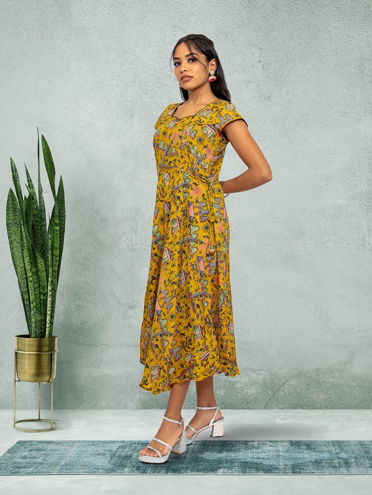 Embrace elegance with our Tranquil Threads yellow knee-length dress. Featuring a stunning print, this dress is perfect for everyday wear or a night out in the city. Crafted with care for the modern woman who values both comfort and style. Key Specifications : Material Kalankari Silk Occasion Casual Type Fusion/Indowestern Knee-length Printed Sundress, Printed Fitted Knee-length Sundress, Fitted Knee-length Printed Sundress, Printed Knee-length Sundress, Yellow Knee-length Floral Dress, Printed Sundress In Midi Length, Printed Sundress Midi Length, Printed Flowy Midi Dress, Flowy Printed Midi Dress