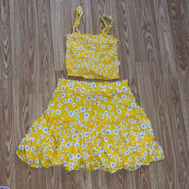 Never Worn, Tags Still Attached. Tie On Front Is Just Decorative, Top Is Smocked. Cute Yellow Sets For Summer, Cute Yellow Summer Sets, Cute Yellow Summer Set, Yellow Sleeveless Beach Sets, Spring Two-piece Sleeveless Set, Yellow Beachwear Matching Set, Yellow Two-piece Set For Spring, Sleeveless 2-piece Set For Spring, Yellow Sleeveless Sets For Summer