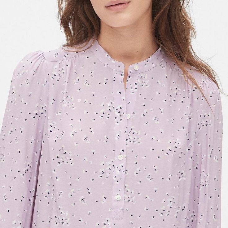 I Love This Pretty Blouse From Gap! It's Quite Long At The Back (Tunic Length), But Tucks Pretty Nicely In The Front. Smooth, Lightweight Weave With Silky Drape And Subtle Texture.Long Blouson Sleeves, Banded Cuffs.Stand Collar, Half-Button Front. Colors:Lilac, White And Navy Fitted Button-up Gap Tops, Casual Gap Shirt For Daywear, Casual Daywear Shirt By Gap, Gap Relaxed Fit Shirt For Spring, Gap Button-up Blouse For Daywear, Gap Cotton Blouse With Relaxed Fit, Gap Cotton Blouse Relaxed Fit, Gap Tops For Summer Workwear, Gap Summer Workwear Top