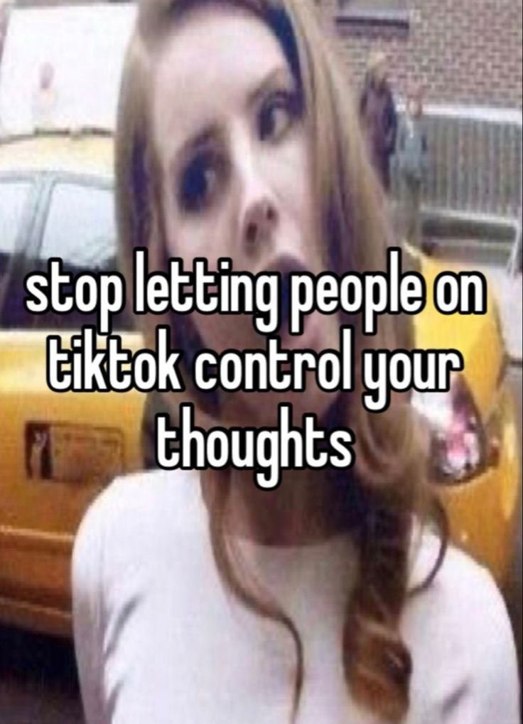 a woman standing in front of a taxi with the words stop letting people on tik to