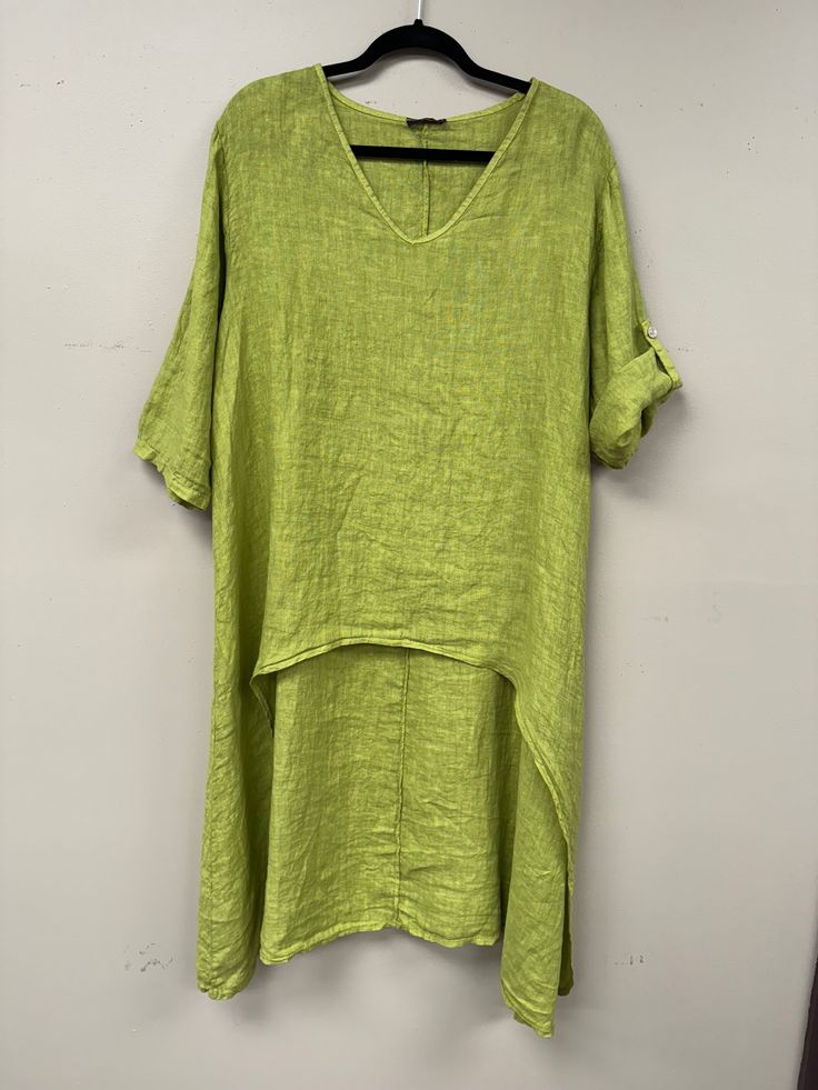 Elevate your wardrobe with our Italian linen Hi-low top. Indulge in luxury with the graceful Hi-Low effect, perfect for any occasion. The soft, comfortable fabric and versatile rolled short sleeve add a unique touch. A must-have exclusive piece for the sophisticated and tasteful. Green Half Sleeve Tops For The Beach, Green Half-sleeve Top For Vacation, Green Half Sleeve Tops For Vacation, Green Half Sleeve Top For Vacation, Linen Blouse For Layering With Short Sleeves, Linen Short Sleeve Blouse For Layering, Short Sleeve Linen Blouse For Layering, Green Relaxed Fit Blouse For Layering, Summer Relaxed Fit Solid Color Short Sleeve Top