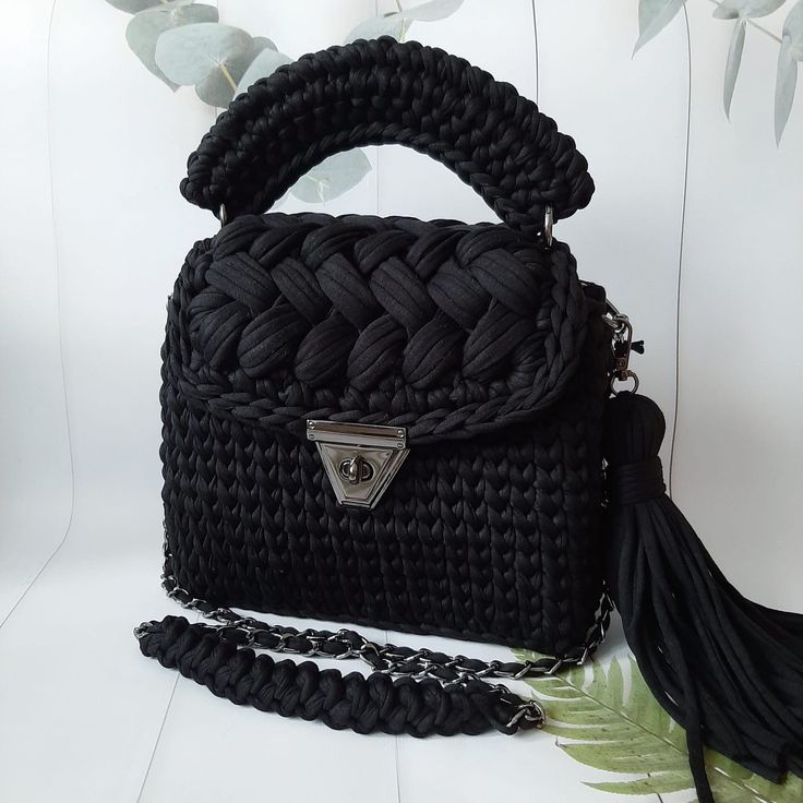 Title: Bag/Handmade Bag/Hand Woven Bag/Crochet Bag/Knitted Bag/Colorful Bag/Black Bag/Designer Bag/Luxury Bag/Shoulder Bag/Luxury Bag/Women's Bag/Gift for Him / Personalized Gifts / Valentinies Day Gift for Him / Self Gift Unique handmade knitted women's purse. Made with ecofriendly t-shirt yarn. It will complete your elegance with daily and evening clothes. Do not wash in washing machine. Do not use bleach. Fashionable bag for evening, coctails. Size: 9x8 Inches - 23x20 Centimeters Products will be disinfected and sent. If you want this item in different size or colour, please contact me. ★ Discover our products on: https://www.etsy.com/fr/shop/DuruBagStore Your orders will be shipped in fast delivery 💝 Crochet Top Handle Shoulder Bag, Casual Black Knitted Shoulder Bag, Black Crochet Bag Hand Knitted For Everyday Use, Black Crochet Shoulder Bag For Everyday, Casual Black Crochet Bag, Black Woven Satchel Shoulder Bag, Trendy Black Handwoven Shoulder Bag, Black Woven Crochet Bag For Daily Use, Trendy Black Handwoven Bag