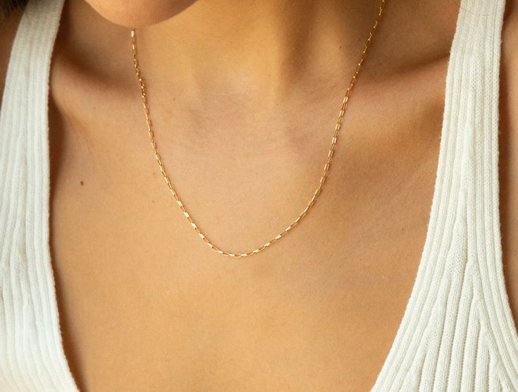 14k gold filled & made to live in! This necklace is the perfect layering piece. Adjustable in the back with 2 inches of extension chain. Everyday 14k Gold Charm Necklaces With Gold Chain, Everyday 14k Gold Charm Necklace With Gold Chain, Gold Minimalist Chain Necklace For Everyday, Minimalist Cable Chain Jewelry For Everyday, Everyday 14k Gold Filled Charm Necklaces With Figaro Chain, Minimalist 14k Gold Filled Charm Necklace For Layering, 14k Gold Filled Chain Necklace For Everyday, 14k Gold Filled Figaro Chain Charm Necklace For Everyday, Everyday 14k Gold Filled Charm Necklace With Figaro Chain