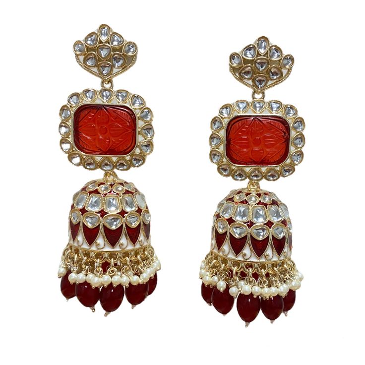 The Maroon Jiya Earrings are unique, and lightweight Jhumkas with Kundan, Meenakari and Gold-Plating on beautiful hydro beads. Specifications Materials used: Kundan, Meenakari, hydro beads, Gold Plating Weight: 41 g Height: 3.5 inches At Romikas, we pride ourselves on the craftsmanship and high quality of our jewelry, designed to enhance your natural beauty. Please contact us with any questions. Kundan Fusion Jhumkas, Fusion Kundan Jhumkas Drop Earrings, Festive Fusion Kundan Jhumkas, Fusion Style Kundan Jhumkas, Cutdana Earrings For Puja And Navratri, Navratri Cutdana Earrings For Puja, Cutdana Earrings For Puja During Navratri, Kundan Fusion Dangle Jhumkas, Fusion Style Kundan Dangle Jhumkas