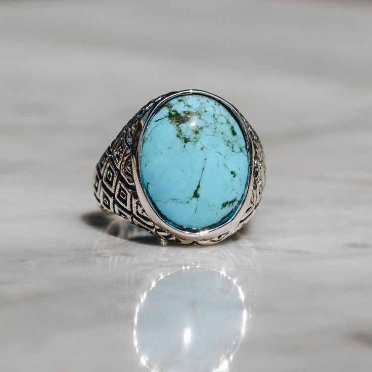 Classic style Indonesian ring in sterling silver with an oval Chrysocolla stone. This vibrant blue ring looks great on any finger for both women and men. Chrysocolla is a copper stone that resonates with the vibrations of the Earth and helps clear blockages from the throat chakra. It promotes clear communication and the courage to express oneself. Available in Gold Brass https://etsy.me/2msAubC Ring Size Available in all sizes. Please be sure to find your exact ring size for the finger you want Blue Oval Cabochon Signet Ring With Polished Finish, Classic Turquoise Signet Ring As Gift, Classic Silver Oval Turquoise Ring, Classic Blue Turquoise Ring In Sterling Silver, Blue Oval Cabochon Ring Stamped 925, Blue Oval Signet Ring With Gemstone, Oval Turquoise Ring With Polished Finish As Gift, Classic Blue Turquoise Sterling Silver Ring, Classic Oval Turquoise Gemstone Ring