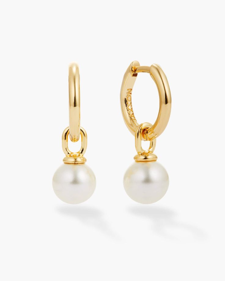 Round out your pearl focused fit with our gold Pearl Hoop Earrings. These women’s hoops feature a single, dangling pearl to bring eye-catching movement and finesse to your look. Timeless Classic Style, Solid Gold Chains, Diamond Simulant, Pearl Hoop Earrings, Silver Shop, Hypoallergenic Earrings, Mens Gold, Pendant Bracelet, Gold Pearl