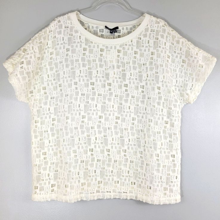 Vince White Cotton Semi-Sheer Textured Knit Classic Pullover Short Sleeve Tshirt Features A Crew Neckline With Ribbed Trim, Short Sleeves, Boxy Fit, And Textured Cotton Knit Construction With Semi-Sheer Panels Throughout. New With Tags, With Minor Flaw. Has A Very Small Snag At The Hem, As Shown In Photo, Which Is Not Very Noticeable And Would Be Hidden If Tucked In. Otherwise In Excellent Condition. Color: White Size: Xl Approx Flat Lay Measurements: Ptp: 24" Sleeve: 12" Length: 26" Material: Cotton/Nylon Offers Welcome! Save More When You Bundle! 25% Off 2 Or More Items From My Closet! Casual Pointelle Knit T-shirt For Spring, Crew Neck Cotton T-shirt With Pointelle Knit, Cotton Pointelle Knit T-shirt With Crew Neck, Cotton Pointelle Knit Crew Neck T-shirt, Open Knit Short Sleeve Top, White Crew Neck Top In Pointelle Knit, Casual Spring Pointelle Knit T-shirt, White Relaxed Fit Knit T-shirt, Crew Neck Pointelle Knit Top