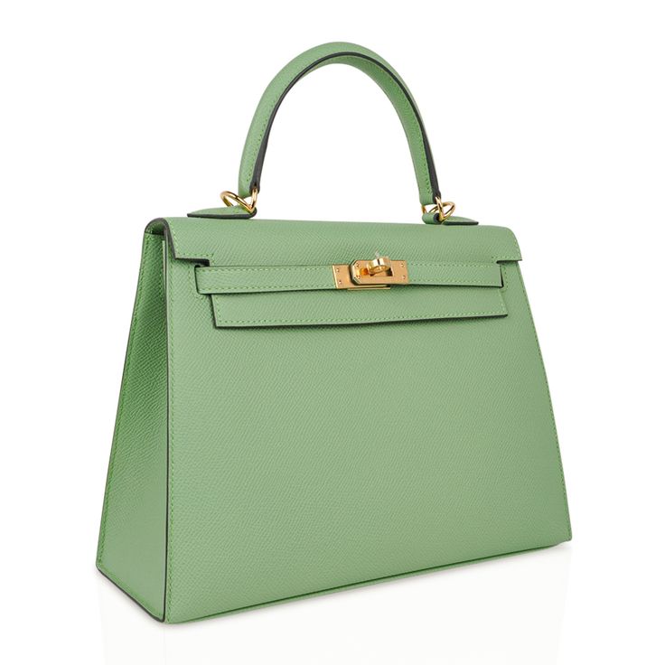 Guaranteed authentic Hermes Kelly Sellier 25 bag featured in fresh Vert Criquet. Stunning Hermes light green that is absolutely neutral. Luxurious with gold hardware. Comes with signature Hermes box, raincoat, shoulder strap, sleepers, lock, keys and clochette. NEW or NEVER WORNThe Hermes Kelly Sellier 25cm bag price retains its value due to the rarity and high demand. As a purveyor of exceptional and unique Hermes luxury goods, mightychic raises the bar of online shopping.final sale BAG MEASURE Green Formal Satchel With Handles, Formal Green Satchel With Handles, Classic Green Satchel For Shopping, Green Formal Satchel With Top Handle, Green Top Handle Satchel For Formal Occasions, Green Luxury Satchel For Daily Use, Elegant Green Satchel For Office, Elegant Green Office Satchel, Classic Green Bag With Detachable Handle