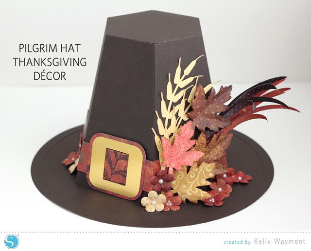 a thanksgiving hat with leaves and other decorations