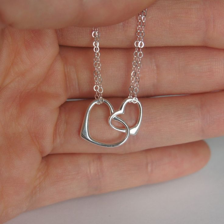 Two hearts necklace + Sterling silver chain (1.4mm) + Sterling silver double heart charm (13x22mm) + Sterling Silver spring clasp + 2 inch sterling silver extender * Every item comes in a pretty gift box * Please contact me for custom sizes or designs Silver Open Heart Necklace For Birthday, Silver Open Heart Necklace For Birthday Gift, Silver Charm Necklace For Birthday Gift, Silver Charm Necklace For Birthday With Lobster Clasp, Dainty Silver Heart Necklace For Birthday, Dainty Silver Heart Necklace For Birthday Gift, Silver Sterling Heart Necklace For Birthday, Silver Heart Charm Necklace For Birthday Gift, Silver Sterling Silver Heart Necklace For Birthday Gift