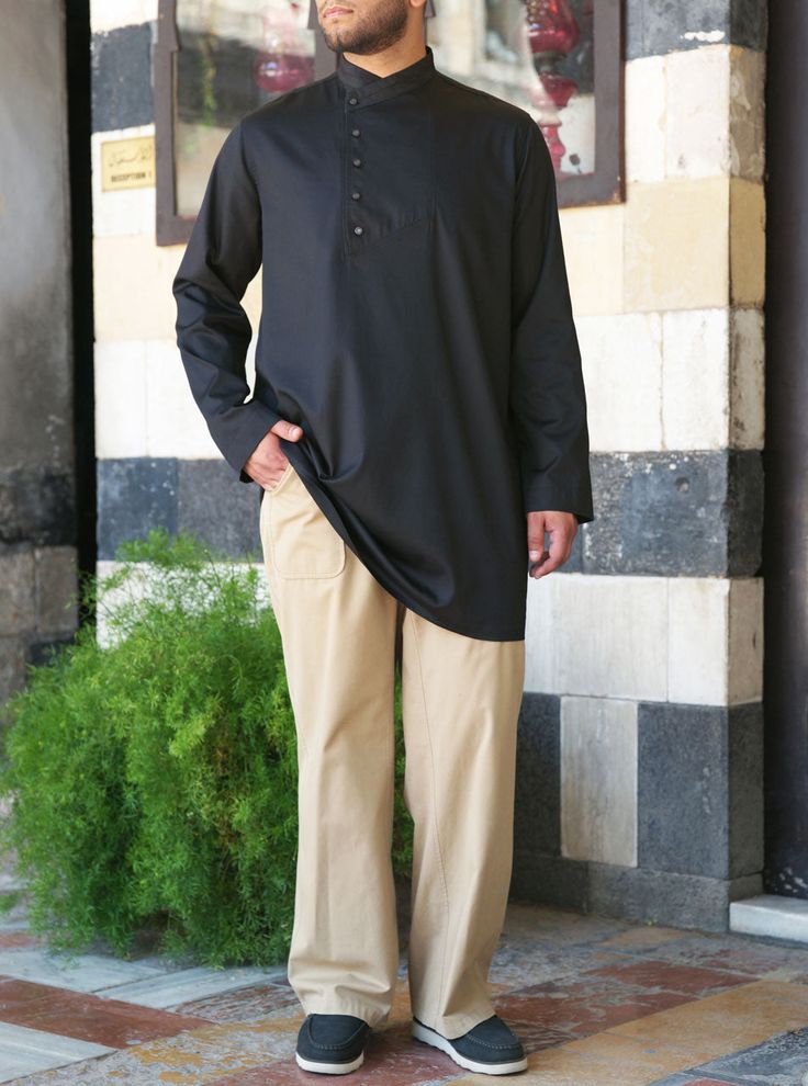 Cross-over mandarin collar Asymmetrical buttoned opening Model is 184cm (6 feet) and wearing size L Item Code: mQ0982 Cotton Long Sleeve Outerwear For Eid, Long Sleeve Cotton Outerwear For Eid, Casual Tunic Kurta For Eid, Casual Kurta For Workwear And Eid, Casual Workwear Kurta For Eid, Traditional Long Sleeve Kurta With Relaxed Fit, Long Sleeve Kurta With Button Cuffs For Workwear, Black Long Sleeve Kurta For Spring, Elegant Long Sleeve Kurta With Button Cuffs