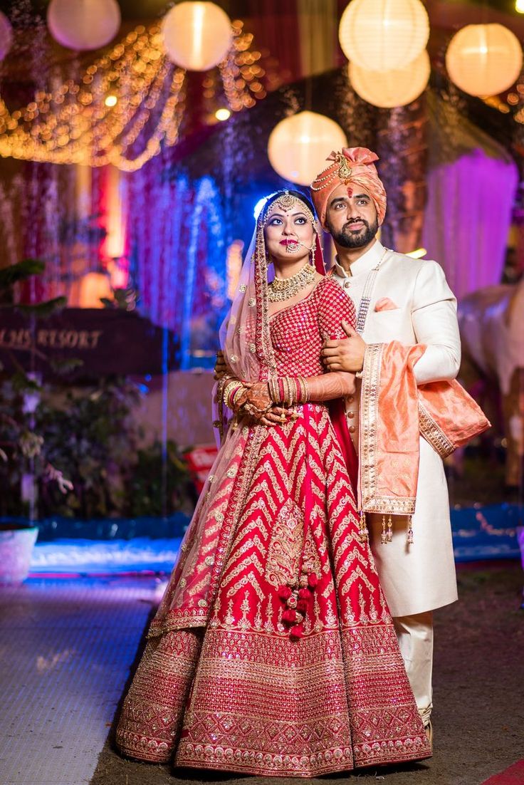 Photo of Contrasting bride and groom with bride in chevron lehenga Bride Groom Photoshoot, शादी की तस्वीरें, Bride Groom Poses, Indian Bride Poses, Indian Bride Photography Poses, Indian Wedding Poses, Bride Photos Poses, Pengantin India, Groom Photoshoot