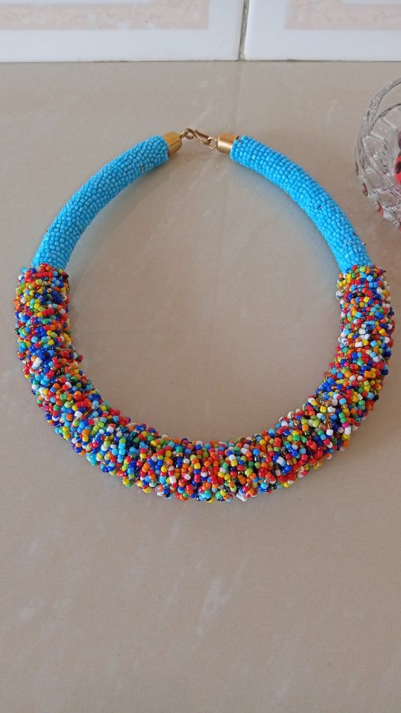 African Handmade Necklace, African Beaded Necklace, Masai Beaded Necklace, African Jewelry, Women Jewelry, Gift For HerThis beaded boho necklace is superbly crafted which can be worn with any outfit at different occasions.Main color - Light blue.The necklace can be available in different colors.Wholesale available at a fair price,please contact me.For any clarification,please send me a convo or an e-mail.Thank you for visiting and happy shopping!!.. Bohemian Large Blue Beads, Blue Polished Beaded Bracelets For Festivals, Blue Beaded Bracelets For Festival With Polished Beads, Traditional Blue Beaded Necklaces, Blue Beaded Necklaces With Tiny Beads For Party, Blue Beaded Necklace With Tiny Beads For Party, Blue Beaded Necklace For Party, Unique Blue Beaded Necklace For The Beach, Unique Blue Beaded Necklace For Beach