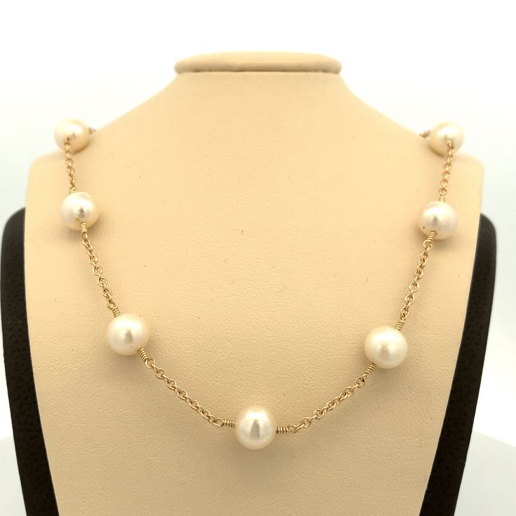 "White Cultured Pearl Station Necklace  14k Gold Wire Wrapped Tin Cup Necklace ~ 16\"   ~ ET864 Beautiful 14k gold cable chain with 14 white Freshwater Pearls that are approximately 7mm in size Heart Shaped Lobster claw clasp for safety Metal Content: 14k Yellow Gold  Chain: Length:  15.75\" Width: 1mm Weight:  11.04 Grams Stamps: 14k Condition: New Each piece is thoroughly examined and refinished as needed by our professional jewelers, tested to guarantee metal content,  graded by our in-house GIA (Gemological Institute of America) Graduate Gemologist, and inspected for quality before being carefully packaged and promptly shipped. Thank you for taking the time to shop with us! We have hundreds of more listings, with more being added every week! From necklaces to bracelets, the classics an White Cable Chain Necklace For Formal Occasions, Formal White Cable Chain Necklace, Elegant 14k Stamped Chain Necklace For Formal Occasions, Elegant 14k Gold Chain Necklace, 16 Inch, Formal White Cable Chain Jewelry, Elegant White Station Necklace As A Gift, Elegant White Station Necklace Perfect For Gift, Luxury Round Station Necklace For Gifts, Elegant White Station Necklace For Gifts