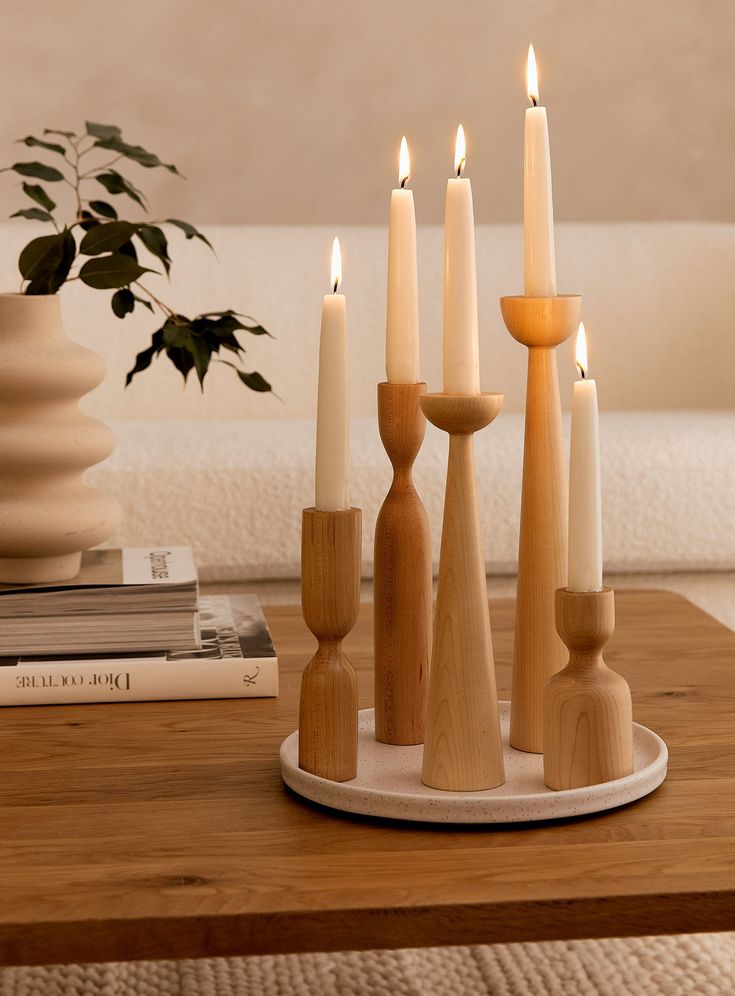 a candle holder with five candles on it