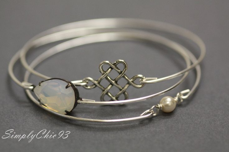 Simply Chic silver bangle set or three .Made with silver plated heavy duty tarnish resistant wire .Secured on both sides. They comes in three different sizes. Small for wrist size 6'' to 6 1/2''..2.5 inches in Diameter (or 8 inch circumference) Medium for wrist size 7'' to 7 1/2'' .2.75 inches in diameter (or 8.5 inch circumference) Large for wrist size 8'' to 8 1/2''. 3 inches in diameter (or 9 inch circumference) The metal is heavy duty and will stay tarnish free for a long time. Clean in jewe Adjustable Silver Bangle For Wedding, Nickel-free Silver Cuff Bracelet For Wedding, Silver Nickel-free Cuff Bracelet For Wedding, Nickel-free Silver Bangle For Wedding, Nickel Free Silver Wedding Bangle, Elegant Nickel-free Cuff Bracelet For Weddings, Nickel-free Silver Wedding Bangle, Silver Cuff Bracelet Bangle For Bridesmaids, Silver Cuff Bangle For Bridesmaid Gift