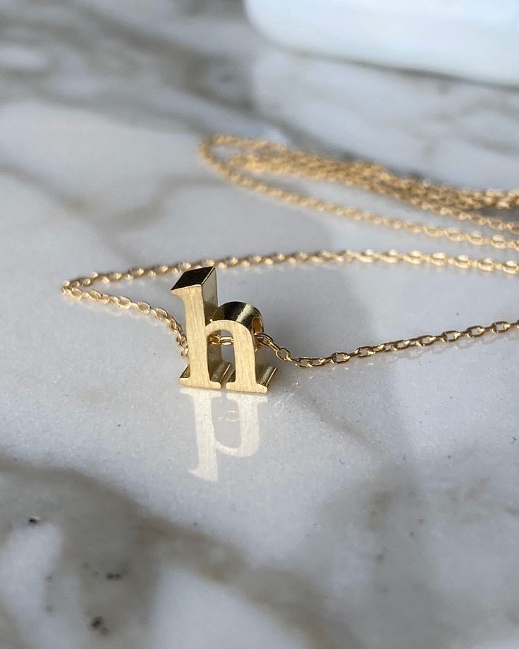 Gold vermeil, gold plated silver letter. Gold filled chain and clasp. Black spinel gems. Will come in a beautiful gift box, To see more jewelry in my shop https://www.etsy.com/shop/BijouLimon To add another letter go here https://www.etsy.com/listing/230015299/vermeil-initial-letter Turquoise Stud Earrings, Jewelry Personalized, Monogram Necklace, Gold Initial, Initial Jewelry, Black Spinel, Initial Letter, Necklace Personalized, Letter Necklace