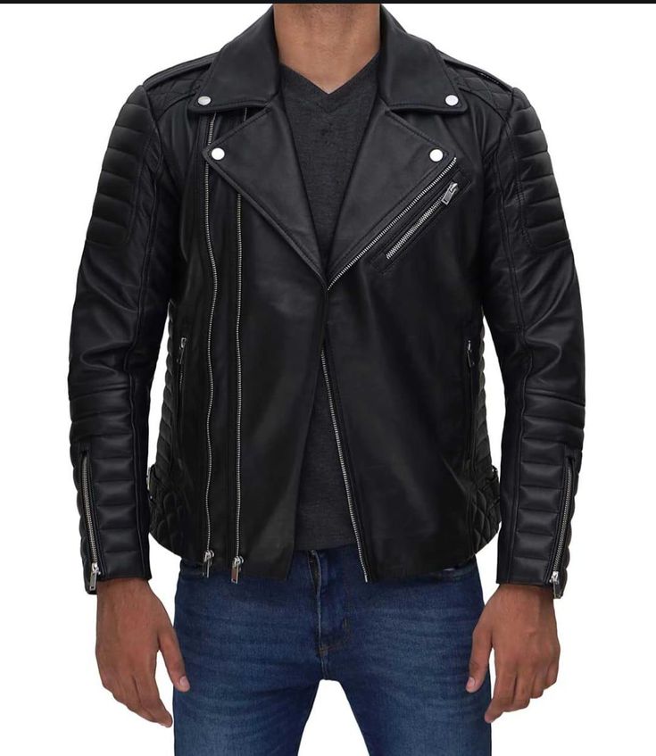 A men's biker style real leather jacket is a popular fashion item known for its rugged, edgy look and durable material. Key features often include: Material: Made from genuine leather, which provides durability and a sleek appearance. Design: Typically features a fitted design, often with a cropped length to the waist. Collar: Often includes a wide lapel or snap-down collar. Zippers: Prominent zippered pockets and front closures, sometimes with asymmetrical designs. Hardware: Metal studs, buckles, and other hardware details add to the rugged aesthetic. Pockets: Multiple pockets for functionality and style. Lining: May have a quilted or smooth lining for comfort and additional warmth. Biker leather jackets are versatile and can be worn casually with jeans and a t-shirt or dressed up with dr Mens Biker Style, Asymmetrical Leather Jacket, Maroon Leather Jacket, Dark Brown Leather Jacket, Leather Jackets For Men, Cafe Racer Leather Jacket, Asymmetrical Style, Shirt Collar Styles, Travel Jacket