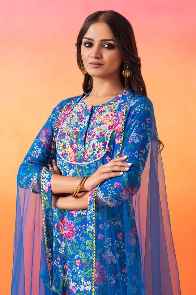 Electric blue kurta with floral print. Paired with a gharara and dupatta.
Components: 3
Pattern: Print
Type Of Work: Floral
Neckline: Round Neck
Sleeve Type: Three Quarter Sleeves
Fabric: Kurta: Printed Crepe, Gharara: Georgette, Dupatta-: Net and Printed Crepe, Satin Lining
Color: Blue
Other Details: 
Model height: 5 ft 7 inches, wearing size S
Occasion: Sangeet - Aza Fashions Blue Kurta, Types Of Work, Three Quarter Sleeves, Aza Fashion, Blue Floral, Electric Blue, Types Of Sleeves, Round Neck, Floral Prints