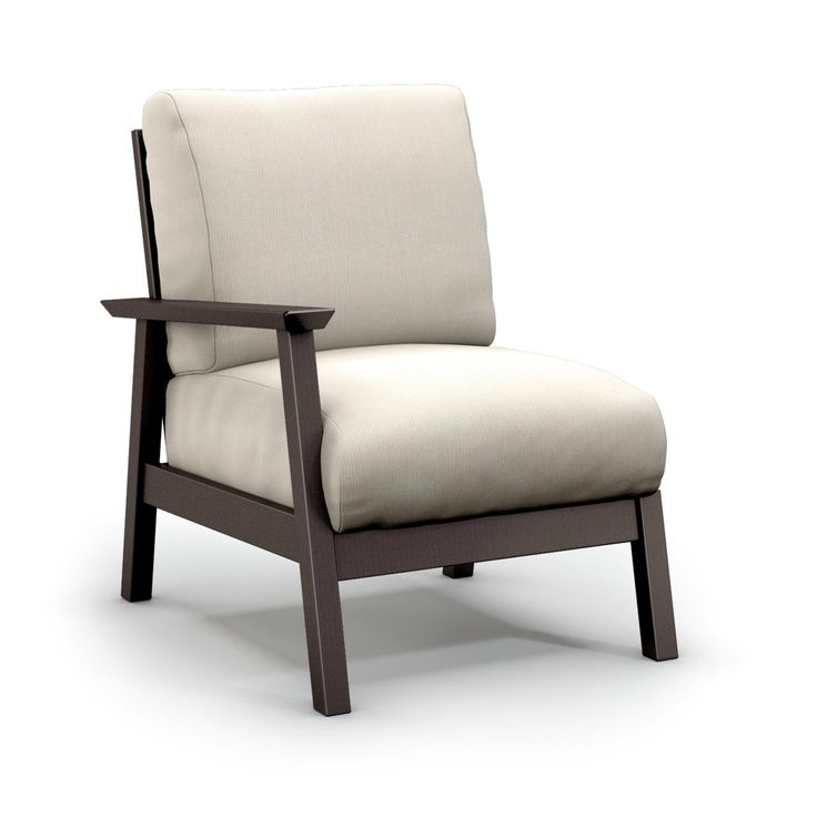 a wooden chair with a white cushion on it's back and armrests