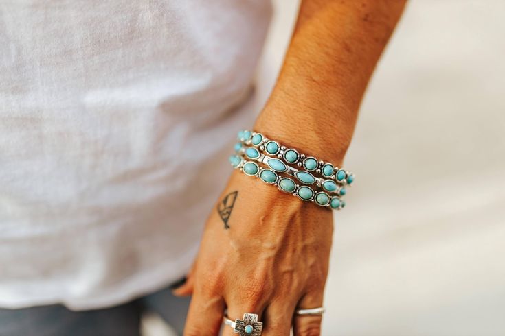 The 3-Piece Turquoise Concho Bracelet Stack is a striking blend of Southwestern elegance and boho charm! Featuring three unique bracelets adorned with beautiful turquoise concho details, this stack adds a vibrant pop of color and texture to any outfit. Perfect for layering or wearing individually, it's a must-have accessory for anyone looking to embrace their Western spirit with style! Faux silver and turquoise Real Turquoise Jewelry, Christian Bracelets, Real Turquoise, Unique Bracelets, Bracelet Stack, Wholesale Fashion, Turquoise Jewelry, Hat Hairstyles, Earring Necklace