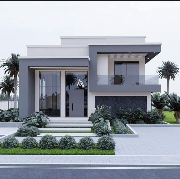 a modern house with palm trees in the front yard