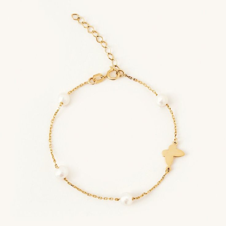 1- D E S C R I P T I O N This 14K Solid Gold Butterfly Bracelet is a charming piece of jewelry that will amplify your everyday style. Made with an elegant butterfly chain design, it features a dainty pearl accent for a subtle hint of sophistication. It's a real 14k gold accessory and a thoughtful gift for her. This dainty bracelet is a standout piece that's versatile for any occasion. 2- P R O D U C T ∙  F E A T U R E S * Gold Material: 14K solid gold * Gold Color Options: Yellow gold, Rose gold, White gold * Stone: Pearl * Chain Length Options: 5", 5.5", 6", 6.5", 7" +1" Extender * Dimensions:  Height: 5 mm / 0.20 in Width: 10 mm / 0.39 in 3- D E L I V E R Y ∙ D E T A I L S We understand that you are looking forward to receiving your order and we are just as excited to get it to you. We t Luxury 14k Gold Pearl Bracelet, Luxury Yellow Gold Rosary Bracelet Gift, Yellow Gold Plated Pearl Bracelet Gift, Gold Plated Yellow Gold Pearl Bracelet Gift, Gold-plated Yellow Gold Pearl Bracelet Gift, Timeless Yellow Gold Charm Bracelet As Gift, 14k Yellow Gold Pearl Bracelet, Gold Pearl Bracelet In 14k, Gold Pearl Bracelet In 14k Fine Jewelry