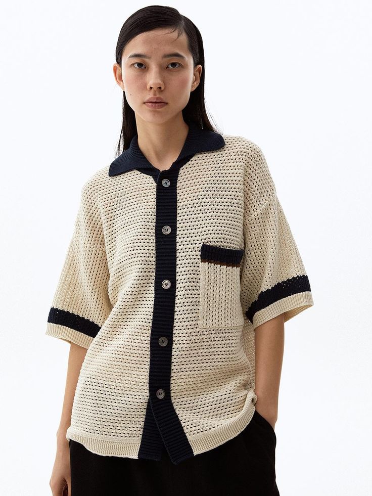 This is a casual and comfortable cardigan that is made out of high quality cotton 100% fabric. With design detail of loose silhouette, point color detail on the collar, cuff, and pocket, it gives a trendy and casual mood.- Loose silhouette- Cool crochet knit texture- Color detail on the collar, cuff, and pocket Collared Sweater With Pockets For Spring, Knit Workwear Tops With Pockets, Knit Tops With Pockets For Work, Casual Cotton Cardigan With Ribbed Collar, Oversized Textured Knit Cotton Outerwear, Beige Textured Knit Cotton Cardigan, Casual Collared Cardigan For Work, Collared Cotton Cardigan With Pockets, Cotton Sweater With Button Cuffs For Spring