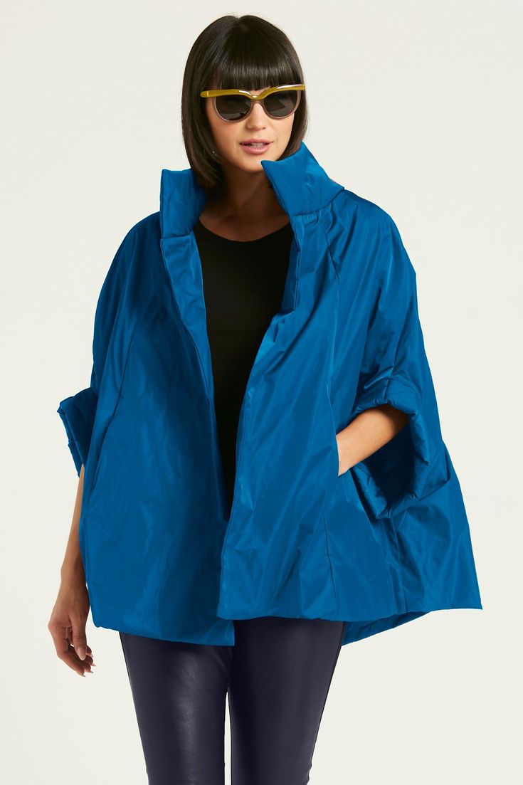 Nylon Jacket - Entirely unexpected in a crisp fabric with a subtle sheen, this cape layers on modern style thanks to its voluminous shape and dramatic high collar. Spring Funnel Neck Outerwear, Oversized Cape With Cape Sleeves, Oversized Solid Color Cape Outerwear, Blue Cape Outerwear For Spring, Spring Layering Cape Outerwear, Scarborough Fair, Short Sleeve Jacket, Easy Shape, Advanced Style