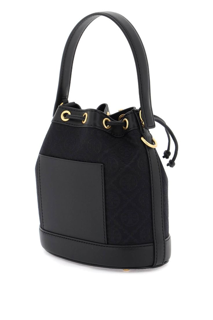 Tory Burch T Monogram bucket bag made of jacquard fabric with leather and tone-on-tone trims. Drawstring closure, fabric with one open leather pocket, additional leather patch pocket at back, single handle, adjustable and detachable shoulder strap and protective studs. Gold-finished metalware. Size Info STANDARD Color Detail Black Made In Cina Material 60%CO 40%PL Season One spring Season Two summer Product bags Brand Tory Burch Size And Fit Bag Length = 20,5 cm, Bag Height = 21,5 cm, Handle Hei Monogram Canvas Top Handle Bucket Bag With Dust Bag, Designer Monogram Canvas Bucket Bag With Top Handle, Monogram Canvas Bucket Bag With Detachable Handle, Monogram Canvas Bucket Bag With Detachable Strap, Travel Bucket Bag With Double Handle In Monogram Canvas, Everyday Bucket Bag In Monogram Canvas With Gold-tone Hardware, Everyday Monogram Canvas Bucket Bag With Gold-tone Hardware, Monogram Canvas Bucket Bag With Leather Handles, Everyday Bucket Bag With Detachable Strap In Monogram Canvas