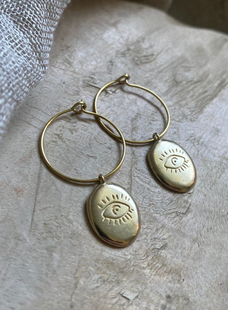 Handmade boho earrings brass creoles diameter 2 cm Handmade 14k Gold Filled Bohemian Earrings, Bohemian Small Hoop Yellow Gold Earrings, Handmade Bohemian 14k Gold Filled Earrings, Bohemian Evil Eye Earrings As Gift, Bohemian Yellow Gold Small Hoop Earrings, Bohemian Gold Jewelry With Evil Eye Detail, Bohemian Yellow Gold Brass Earrings, Hammered Brass Dangle Hoop Earrings, Bohemian 14k Gold-filled Earrings