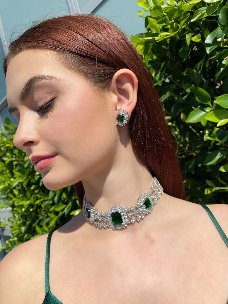 Handmade Style: Choker Necklace and Earrings Set Material: Platinum Plated, Lab Simulated Emerald and White Sapphire Stones Size: Earrings measure 1.5 inches long Imported Please Note: This necklace and earrings are sold as a set. Item Number: 6711