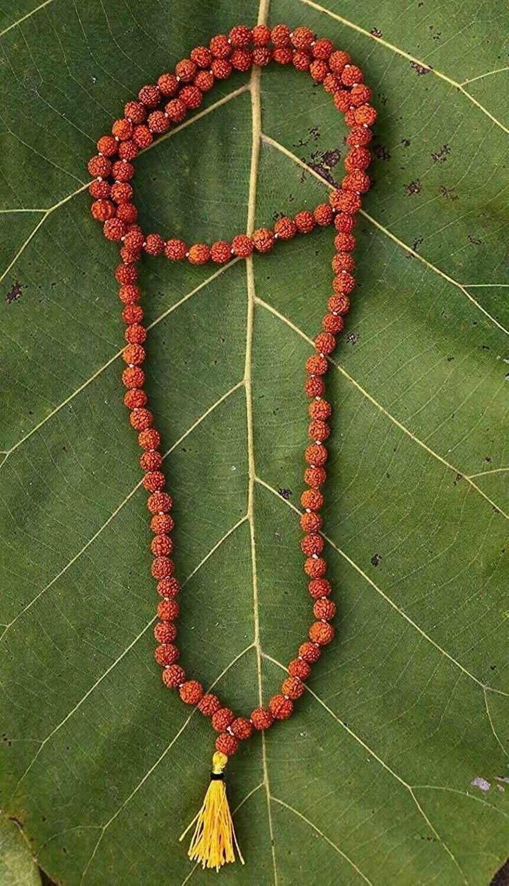 SMALLEST Very small and rare Rudraksha mala of 108+1 Hindu Puja prayer beads    Rudraksh is the sacred seed that literally means "The Eye of Lord Shiva". They have a brownish red, wrinkled appearance. When used while meditating, Rudraksh beads are believed to open the heart chakra, help lower blood pressure and create stability within the entire system Considered highly effective for - Heart Diseases and Blood pressure This Rudraksha mala is made with 5 faced Rudraksha beads. It is associated with electro-magnetic properties, which is good in controlling of blood pressure. It helps to release heat from the body thus good in relaxation Wearing of holy beads means ensuring good health as it is termed as the incarnation of God Shiva Spiritual Mala With 108 Beads For Blessing, Traditional 108 Beads Mala For Healing, Traditional Mala With 108 Beads For Healing, Traditional Round Beads Mala For Blessing, Spiritual Gemstone Beads For Rituals, Traditional Mala With Round Beads For Blessing, Spiritual Mala With Polished Beads For Healing, Spiritual Healing Mala With Polished Beads, Traditional Mala With Gemstone Beads For Healing