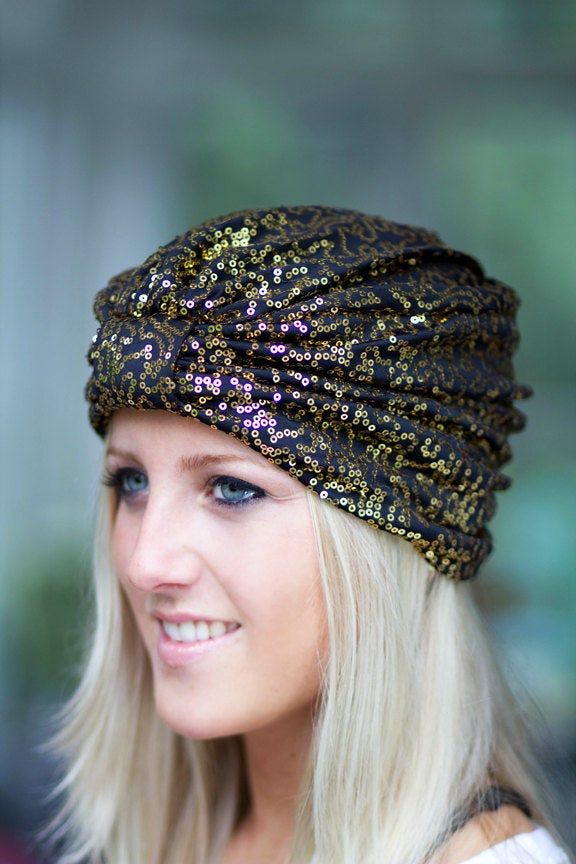 One part exotic, one part glam...this glittering, sequined, fashion turban is all parts show-stopping style!! Sparkle in the sunshine, sparkle in the disco light...this piece has it's own magic and looks as great with a simple t-shirt as it does with a festive maxi dress!! Tuck your hair up into it for a 1920's take on the item, or let your hair fall loose for a more bohemian vibe. ♥Extra stretchy; One size will fit most. ♥95% polyester; 5% spandex sequin fabric. ♥Lined with 95% Rayon; 5% spande Gold Headwrap Headband For Party, Gold Turban Headband For Party, Gold Turban Style Headband For Party, Black Headband Turban For Party, Black Party Turban Headband, One Size Party Headscarf Headband, One Size Party Headband Headscarf, Party Headband Headwrap, Fitted Headband Headscarf For Party