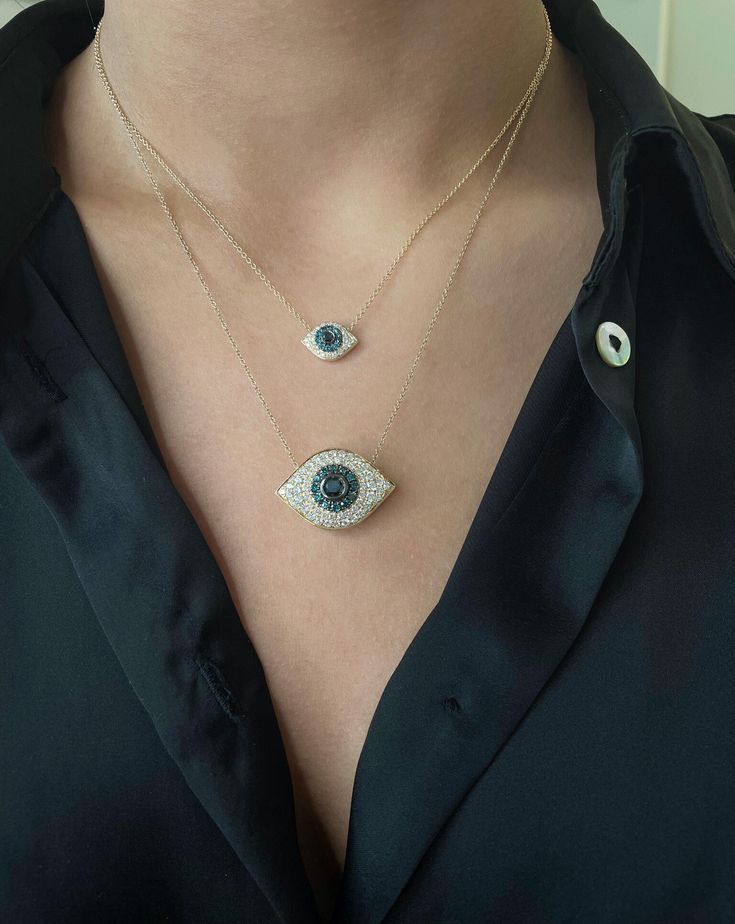 "𝓦𝓮𝓵𝓬𝓸𝓶𝓮 𝓽𝓸 𝓛𝓲𝓸𝓷𝓱𝓮𝓪𝓻𝓽 𝓳𝓮𝔀𝓮𝓵𝓻𝔂 𝓢𝓱𝓸𝓹 ♥ Beautiful Diamond Evil Eye Heart Charm Necklaces, crafted in 14K Gold. These necklaces come in 2 sizes as listed below. *Please check measurements below, items may appear larger on the screen. 8.5mm Evil Eye Charm Necklace Black Diamonds: 0.08 carats Blue Diamonds: 0.12 carats Diamonds: 0.18 carats 17.5mm Evil Eye Charm Necklace Black Diamonds: 0.40 carats Blue Diamonds: 0.36 carats Diamonds: 1.31 carats ITEM DETAILS Made to Order Blue Diamond Jewelry With Diamond Eyes, Black Sapphire Fine Jewelry, Blue Sterling Silver Necklace With Diamond Eyes, Gift Black Necklace With Diamond Eyes, Elegant Black Evil Eye Jewelry, Gift Black Necklaces With Diamond Eyes, Blue Diamonds, Diamond Evil Eye, Charm Necklaces