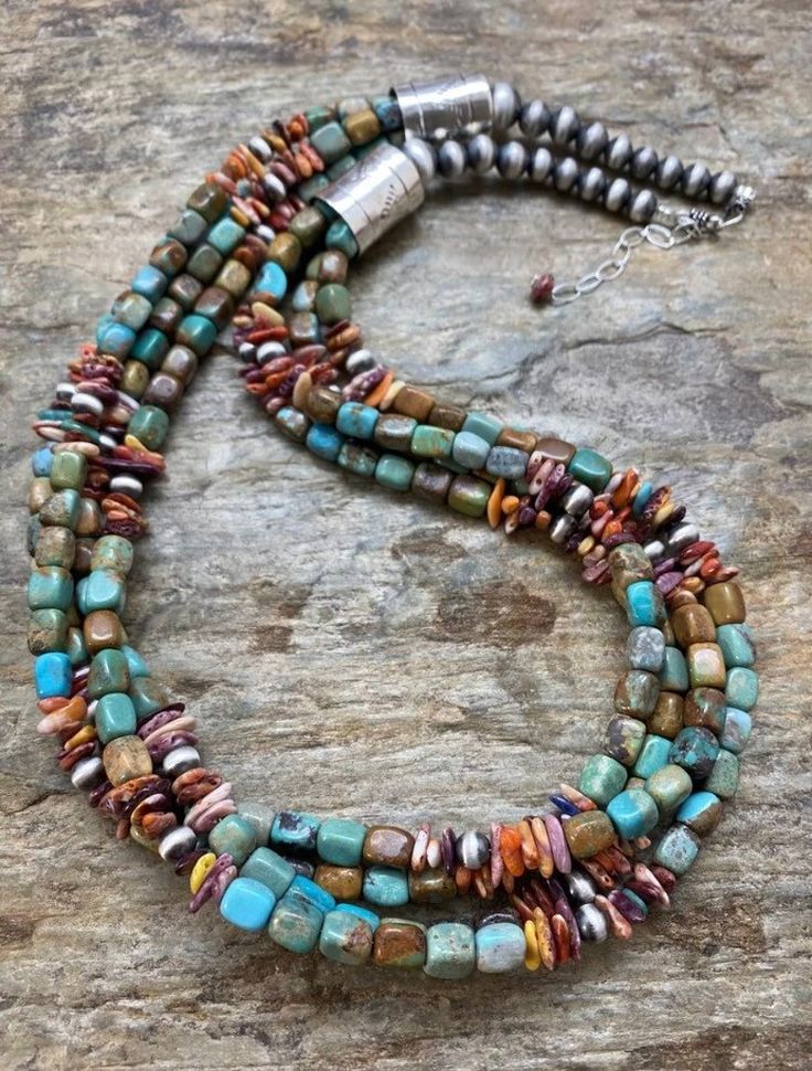 Southwestern Multi-strand Turquoise Jewelry, Turquoise Multi-strand Hand-strung Jewelry, Turquoise Double Strand Polished Bead Jewelry, Turquoise Double Strand Hand-strung Jewelry, Artisan Double Strand Turquoise Jewelry, Multi-strand Turquoise Necklace With Natural Stones, Double Strand Turquoise Jewelry With Colorful Beads, Unique Multi-strand Turquoise Necklace, Unique Turquoise Double Strand Beaded Necklaces