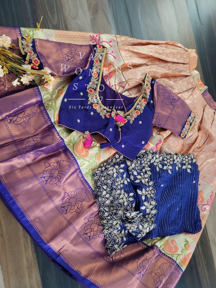 This Traditional Half Saree Set is a must-have for any woman looking to add a touch of elegance and tradition to her wardrobe. Made from premium quality Kanchi material, this saree set is not only beautiful but also durable and comfortable to wear. The set includes a blouse that is stitched and comes in a size 34, with inner margins that can be expanded up to size 40. For those who need a size 32, alterations can be done upon request. The lehenga is also expandable and has inner margins to incre Traditional Drape Dola Silk Set, Silk Designer Sets For Navratri, Silk Sets For Designer Wear Navratri, Silk Sets For Designer Wear During Navratri, Elegant Chanderi Sets With Unstitched Blouse, Bollywood Art Silk Sets For Designer Wear, Unstitched Designer Sets With Traditional Drape, Zari Work Silk Saree Set, Silk Saree Sets With Zari Work