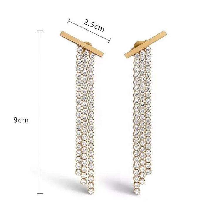 Dazzle them all in the Brooke Dangle Earrings. Wear these gems on a night out to instantly elevate your look and really make an impression. 18k Gold Plated over Stainless Steel 9cm Drop Cubic zirconia Hypoallergenic Water tarnish resistant Made to last Leather Handbags Tote, Cz Earrings, Drops Design, Gold Filled Jewelry, Original Gift, Cz Stone, Adjustable Rings, Semi Precious Gemstones, Ring Bracelet