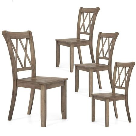 four wooden chairs sitting next to each other