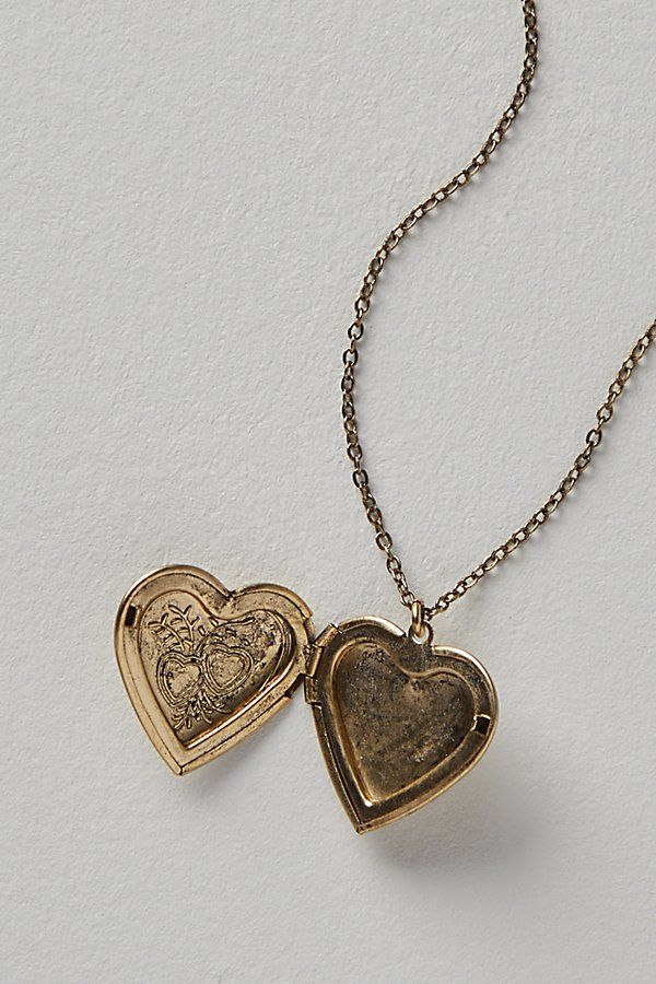 A super sweet gift or an accessory unique to you, this darling monogram necklace features a heart locket pendant with an initial engraving. **Features:** Dainty chain, heart locket pendant, hinge opening mechanism, monogram initial engraving, clasp closure **Why We | Monogram Necklace by Free People in Gold Vintage Personalized Pendant Jewelry Gift, Vintage Pendant Jewelry For Personalized Gift, Personalized Brass Jewelry For Valentine's Day, Antique Heart Jewelry For Anniversary, Vintage Engraved Heart Necklace For Anniversary, Antique Heart-shaped Jewelry For Anniversary Gift, Vintage Charm Initial Pendant Jewelry, Vintage Initial Pendant Jewelry With Charm, Vintage Personalized Charm Necklaces For Wedding