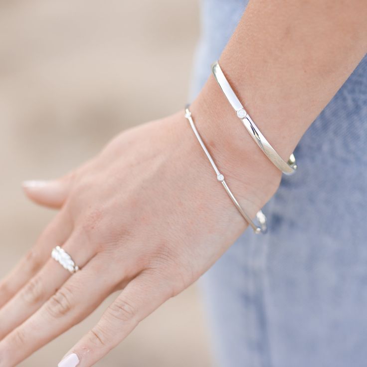 FREE shipping on all orders! FREE 5 Day Returns! Learn more. Storyteller by Vintage Magnality Bezel-Set 1/4 CTW Natural Diamond Bangle 8 Inch Bracelet in Solid 14K Gold Introducing our stunning Wear Everyday® Bezel-Set Natural Diamond Bangle 8" Bracelet, crafted in your choice of solid 14K yellow, rose or white gold or sterling silver. This exquisite piece of jewelry is the epitome of elegance and sophistication, featuring a delicate yet durable bangle adorned with 1/4 CTW of dazzling natural di Diamond Cuff Bracelet, Diamond Bangle Bracelet, Gold And Silver Bracelets, Accesories Jewelry, Diamond Bangles Bracelet, Dainty Chain, Chain Bracelets, Silver Bow, Bezel Set Diamond