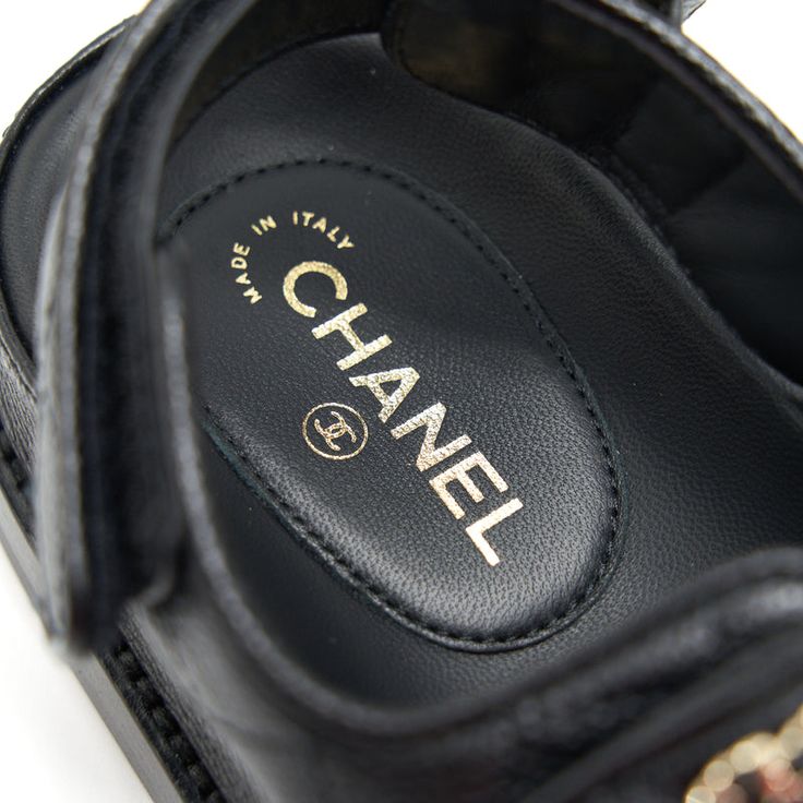 Lender Description Chanel quilted sandals size 7 US fits true to size. Brand Description This is an authentic pair of CHANEL Grained Calfskin Velcro Dad Sandals Black. These stylish sandals are crafted of black calfskin leather and feature black leather velcro straps with black resin and gold CC logo buttons. These are excellent sandals for a timeless look only from Chanel! Chanel Dad Sandals, Brand Description, Dad Sandals, Louis Vuitton Shop, Stylish Sandals, Black Resin, Cc Logo, Sandals Black, Velcro Straps