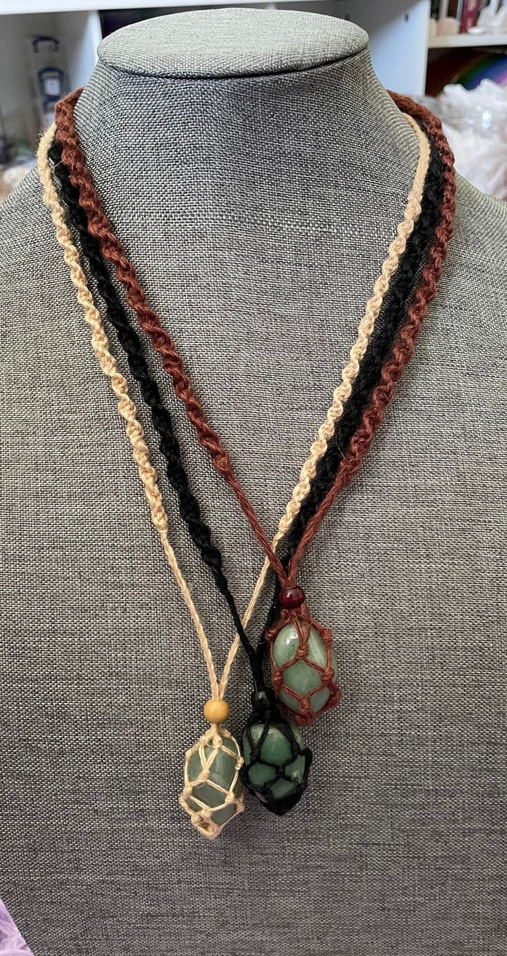 These one of a kind hemp macramé necklaces come in three colors: black, brown and tan, with one Aventurine stone. The necklace is 12-13 inches in length. None are exactly the same!! When you receive your necklace, it will be prefilled with one Aventurine crystal and will arrive safely in a pretty mesh pouch. Also included are crystal care and cleansing instructions along with a crystal properties card. All the Crystals I sell are cleansed, charged & well cared. They're perfect for metaphysical u Hemp Necklace Pattern, Men’s Crystal Necklace, Cool Necklaces Unique, Earthy Beaded Necklace, Crochet Crystal Necklace, Cristal Necklace Diy, Crystal Crafts To Sell, Hemp Necklace Diy, Easy Necklaces To Make