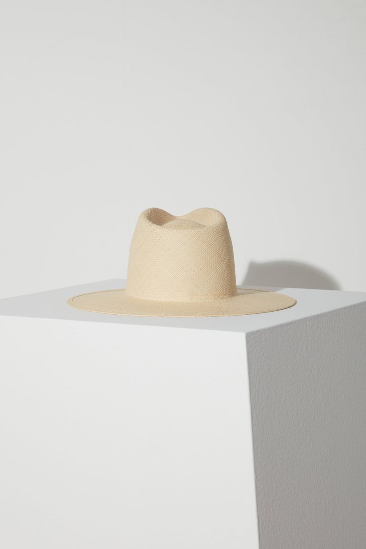 Details Greta is meticulously crafted from natural-toned Panama straw into a structured silhouette with a flat brim, conjoining sophistication and craftsmanship to create the ultimate straw staple. · Brim: 3.5"· Crown: 4.75"· Structured Panama Straw Fit Runs true to size. If between sizes, we suggest sizing up. Beige Straw Panama Hat With Curved Brim, Beige Woven Straw Hat With Curved Brim, Elegant Natural Panama Hat In Fedora Style, Elegant Natural Panama Fedora Hat, Chic Beige Toquilla Straw Panama Hat, Elegant Woven Sun Hat In Toquilla Straw, Elegant Unlined Panama Hat With Curved Brim, Modern Summer Fedora Panama Hat, Elegant Woven Sun Hat Made Of Toquilla Straw