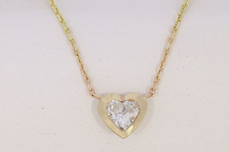 "Our new special design features a Heart shape Natural Diamond: * Gem Stones: 100% Natural Diamonds * Diamond Measurements: 0.30-0.35ct Heart Shape * Color and Clarity: F Si1-Si2 * Material: High Quality Solid Gold 14k * Pendant Width: 6.90-7.10 m\"m * Pendant Height: 6.50-6.70 m\"m HOW TO ORDER- * All our work is custom made by hand :) * Simply use the Menu Bar, choose gold material and length :) * The ring will be made for you and ready to be shipped in 6-8 business days. INFORMATION * All pie Formal Polished Heart Cut Necklace, Elegant Polished Heart Cut Necklace, Elegant Heart Cut Necklace With Polished Finish, Formal Heart Pendant Necklace In Fine Jewelry Style, Formal Fine Jewelry Heart Pendant Necklace, Elegant Heart Necklace With Polished Finish For Wedding, Elegant Heart Necklace With Polished Finish For Formal Occasions, Elegant Heart Necklace With Polished Finish For Formal Events, Elegant 14k Gold Heart Necklace For Formal Events