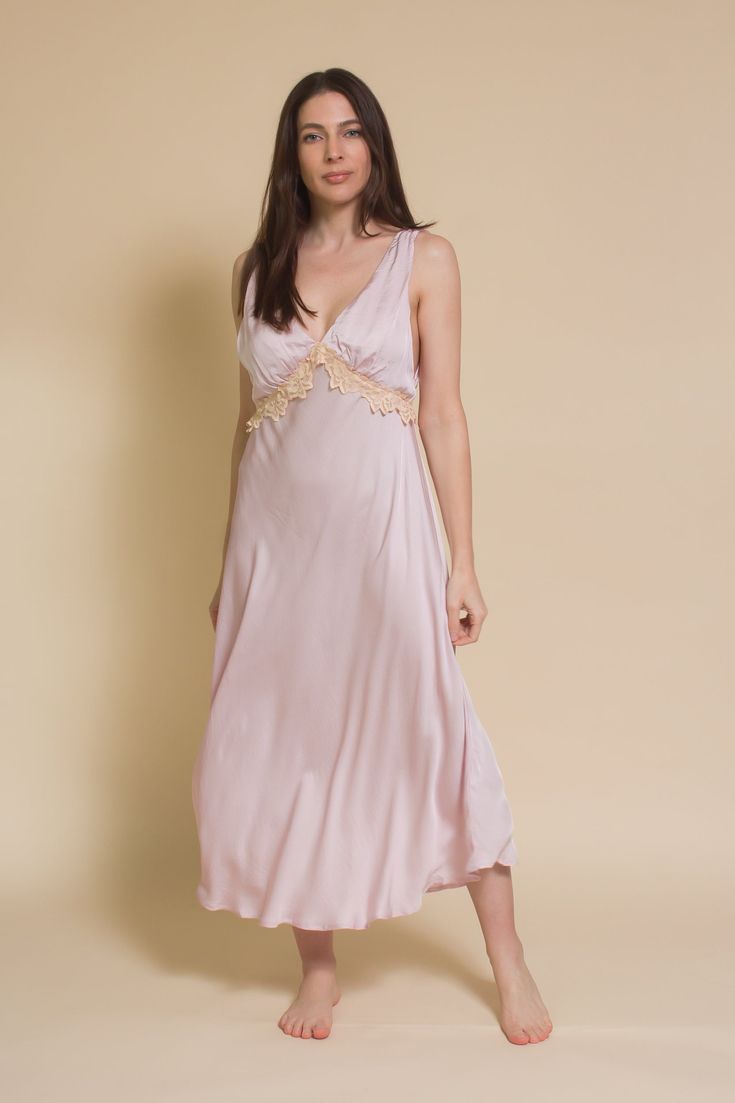 Brand: Olivaceous Vintage inspired silk slip dress with lace trim. ♡ Details Color: Light Lilac V-neckline on front and back Lace trim along bust line and back Top portion is double lined 55% Viscose, 45% Rayon Hand wash Sizing Model Info: Height 5'3"| Bust 32D"| Waist 25"| Hips 34" Model is wearing a size small Fit: Body skimming fit Stretch: No stretch Measurements: S: Bust 32" | Length 47" M: Bust 34" | Length 47" L: Bust 36" | Length 47" Slip Dress With Lace, Dress With Lace Trim, Light Lilac, Knit Outerwear, Knit Denim, Midi Slip Dress, Silk Slip Dress, Sleeveless Bodysuit, 20's Dress